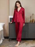 Klassisches Pyjama-Set aus reiner Seide mit Bindebordüre